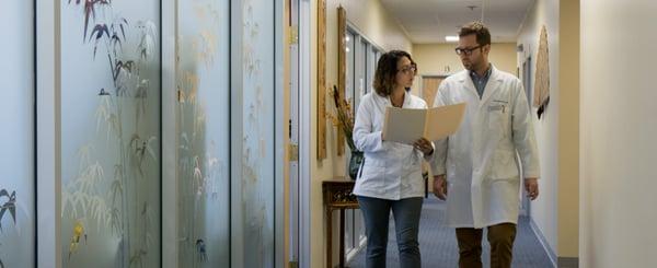 Doctors talking in hallway