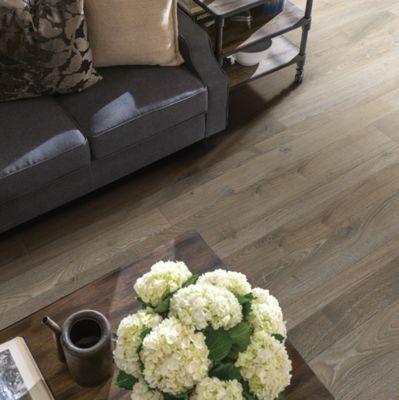 This resilient, sleek laminate flooring sets the tone for an urban appeal.