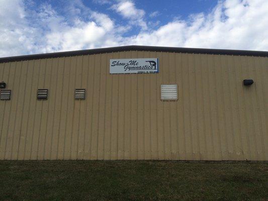 Building view from the street. Entrance is on the northeast side.