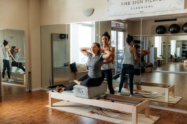 Side Sit-ups on the reformer