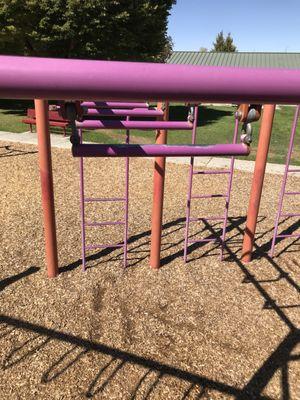 monkey bars on 5-12 yr old playground