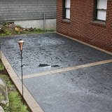 Roman slate stamped driveway border and bands with Graphite and Palamino Davis colors.