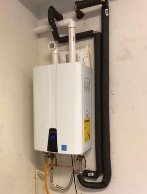 Removed a 75 gallon natural gas water heater and installed a Navien Tankless water heater in its place