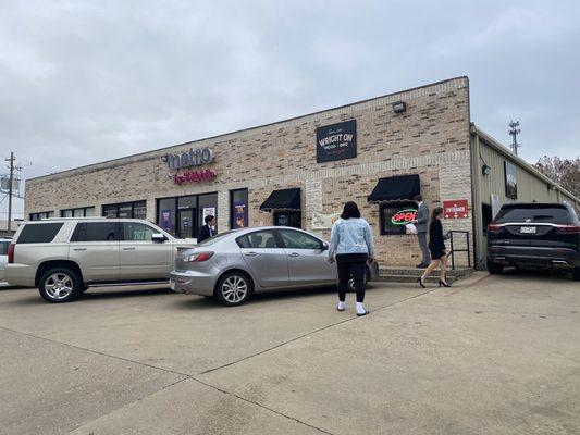 Walk up windows in front, entrance on the right side. Look out for cars in the driver thru.