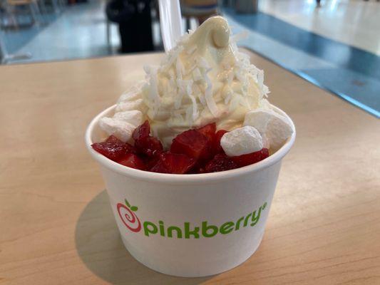 Small island mango with coconut, strawberries and mochi on top