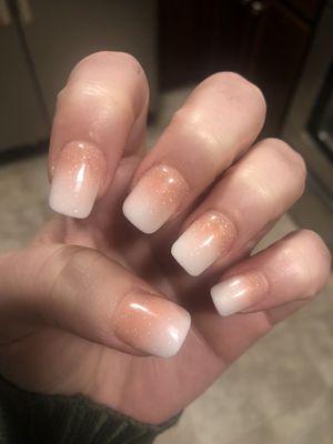 Pink and white ombré acrylic nails done by Thu