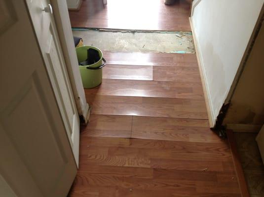 Laminate and plank flooring is almost always destroyed by water.  We can remove and replace within days.