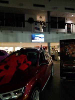 TV mounted in the showroom at Audi of Charlotte