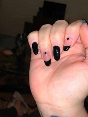 The black on my ring finger smeared. And my nails look grown out when I had just gotten them done on Saturday.