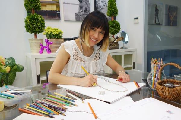 Designer Mimi So sketching in her studio