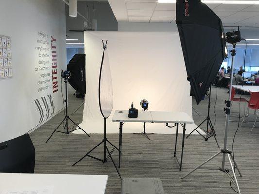 On-location office headshots on your choice of background color.