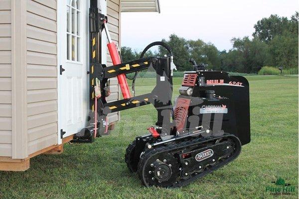 this tiny little machine pulled a 22 foot long shed that's 12 foot wide.  It is AMAZING.  (and no lawn damage!!!!)