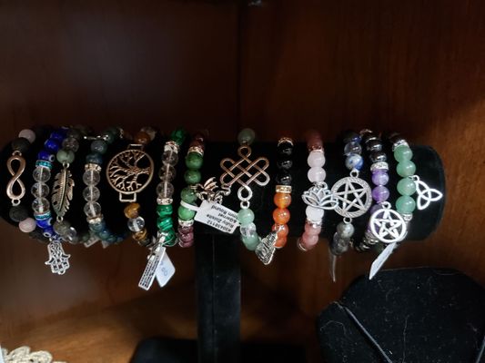 The Charmed Collection: gemstone bracelets with charms.