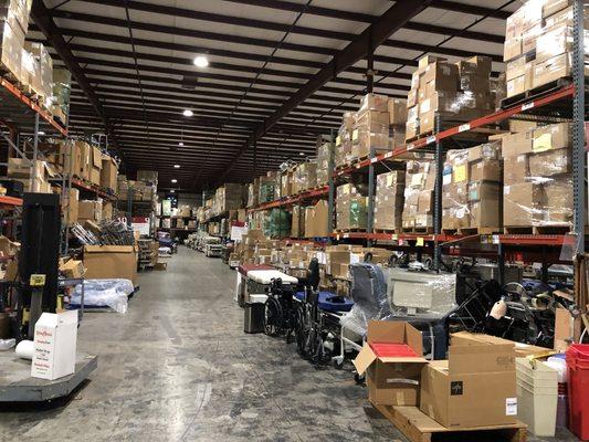 Rows and rows of donated supplies ready to be shipped out.