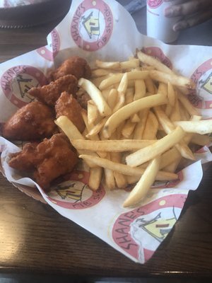 Boneless wings and fries.