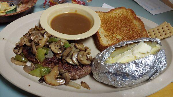 Hamburger steak with grilled onions, peppers, gravy