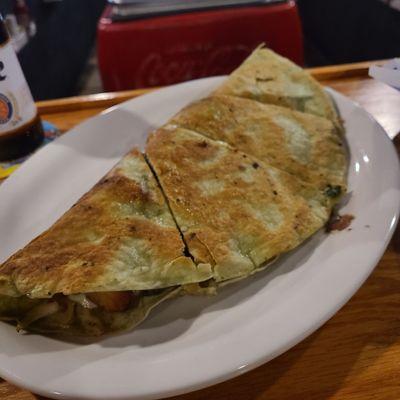 Roast beef quesadilla with onion petals, tomatoes, Jack cheese and horseradish.  So good!