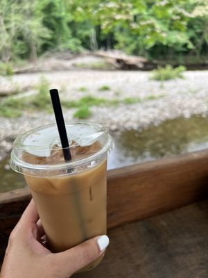 Cold brew coffee with almond milk. Outdoor patio dining.