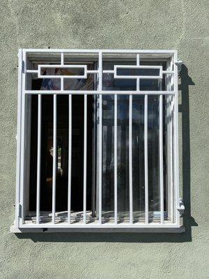 Custom window bar with fire escape system