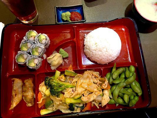 Bento box chicken curry with cali roll yum