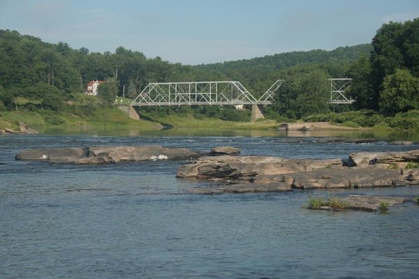 Rocky beach is 7-minute walk downstream from bridge