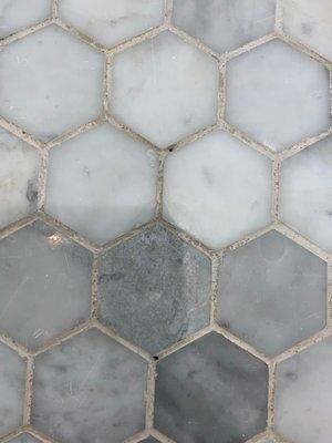 Grout disintegrated on shower floor after 3 Years