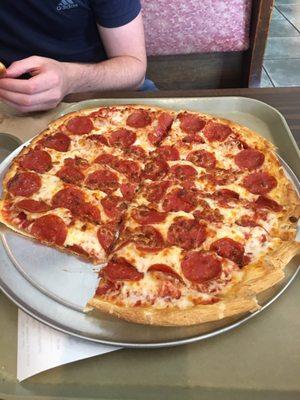 Pepperoni pizza (14 inch) super thin crust, lots of pepperoni and cheese, reminds me of pizza my grandma would make when I was a kid.