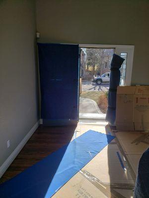 Doors and entryway prepped to prevent damage.