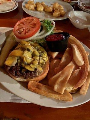 Cheeseburger with added mushrooms and onions