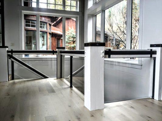 1/2 glass railing system. Designed and installed by Silver Mountain Glass.