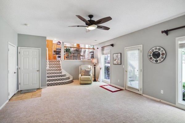 Family room with fireplace, walkout to patio