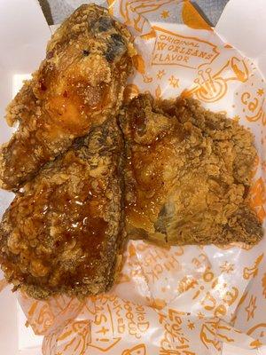 Popeyes slightly glazed spicy fried chicken it's pretty good