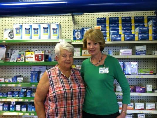 Pharmacist Beverly Coogler and customer