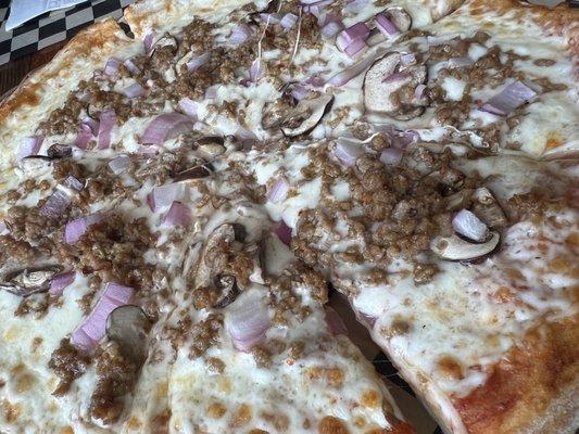 Mushroom Sausage & Onion pizza on Sourdough crust