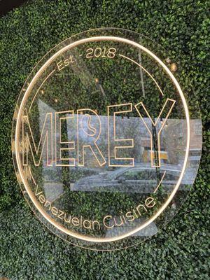 Light up Merey sign on patio