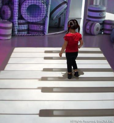 Girl playing Eyeclick at a daycare