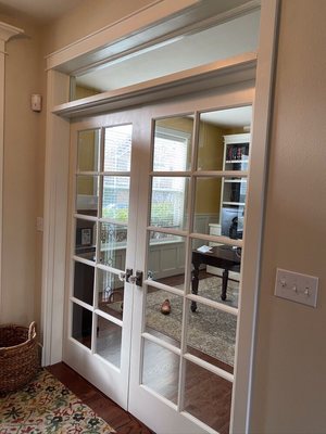 Transom window above French doors