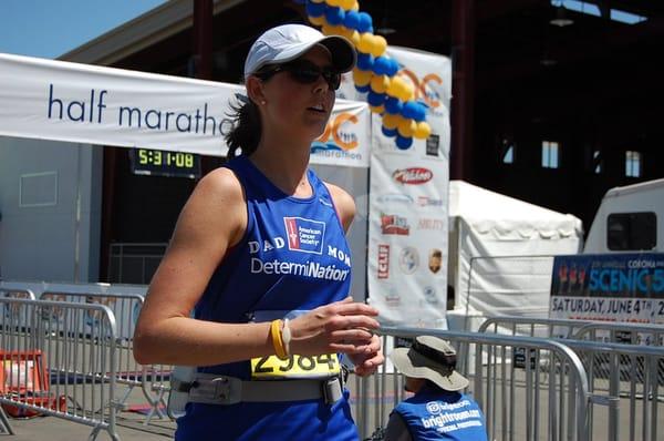 A DetermiNation athlete crosses the finish line after running for a cause in the 2011 OC Marathon.