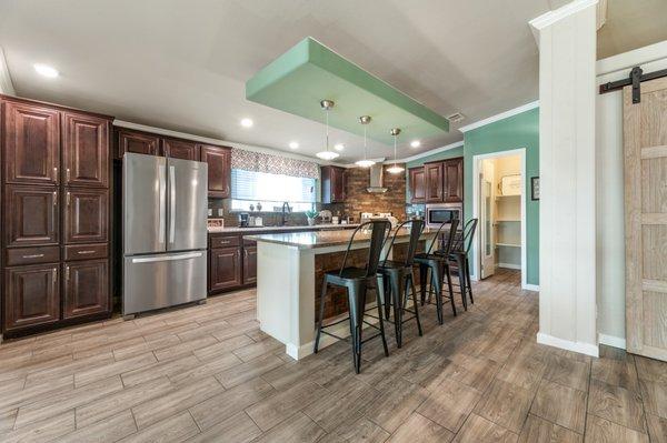 Beautiful Kitchen with Quartz Island and Real Wood Cabinets