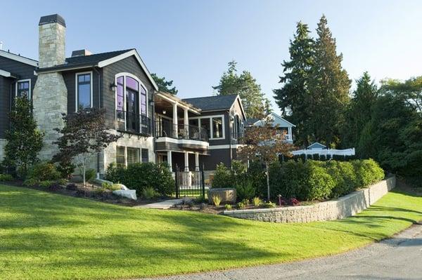 Side yard with stone wall with caps