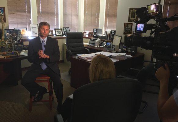 Greg Rizio - Senior Trial Attorney - being interviewed by Channel 2 News.