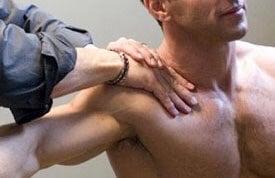 Soft tissue work to the upper trapezius.