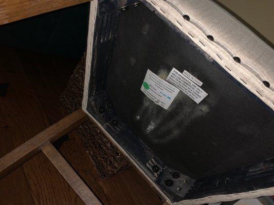 This is the bottom of one of the chairs. I'm 165 pounds, the chairs allegedly are for 250 pounds. It's broken underneath.