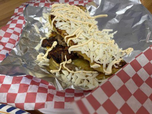 Cachapas with cheese, beef, and plantains.