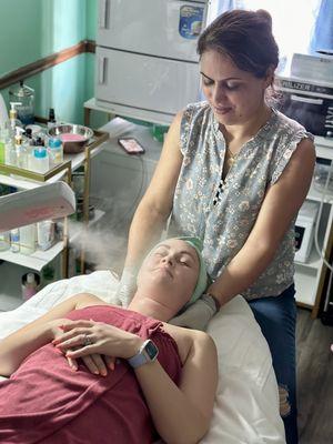 My friend getting her facial which she loved