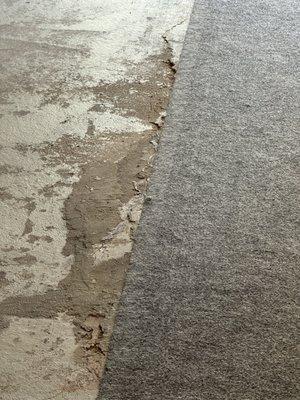 Garage floor disintegrating hidden under a carpet