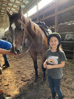 Maya with her favorite horse, Hershey!