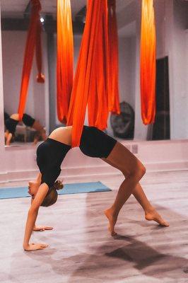 Aerial stretching is an amazing class to improve your flexibility and tone your body.