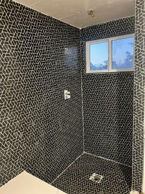 Cool intricate design tile for an AirBNB owner. He bought the property and we did 5 showers for him and stucco work for the exterior!