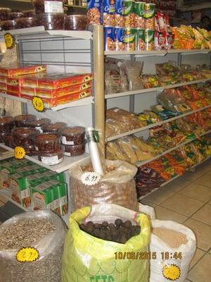 Dried goods, nuts, clean and well stocked shelves in Joseph's Bakery and Market.